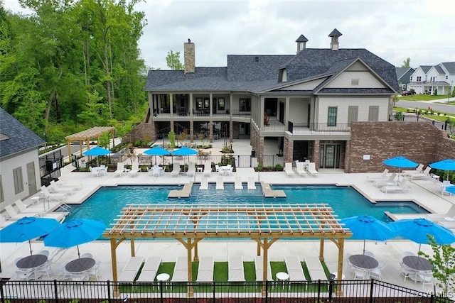 view of swimming pool featuring a patio area