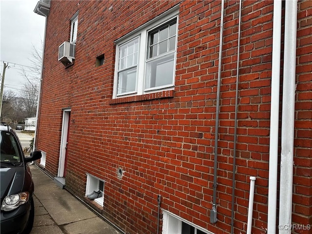 view of side of home with cooling unit