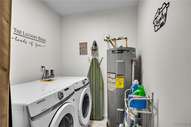 laundry area featuring washer and dryer and water heater