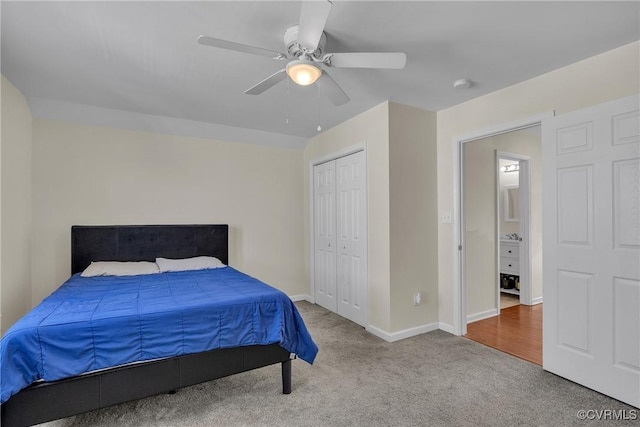 bedroom with ceiling fan, carpet flooring, and a closet