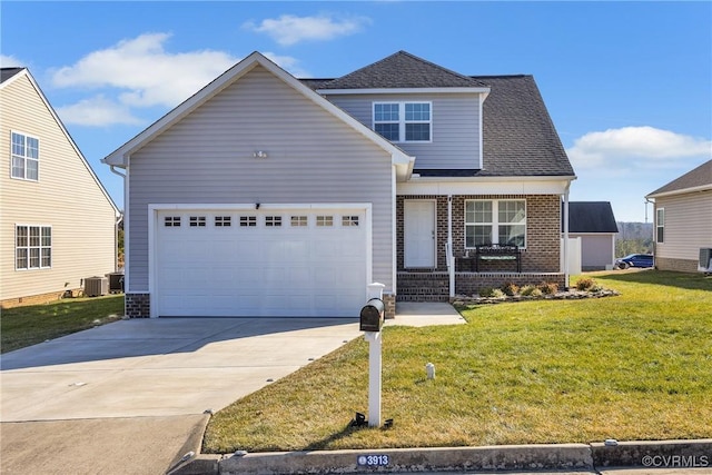 front facade with a garage, a front yard, and central air condition unit