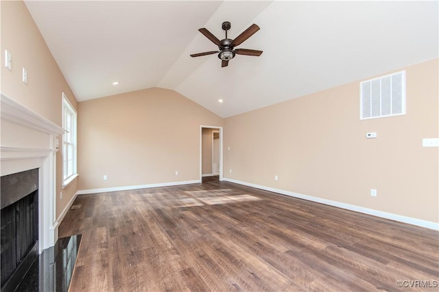 unfurnished living room featuring dark wood-type flooring, ceiling fan, and vaulted ceiling