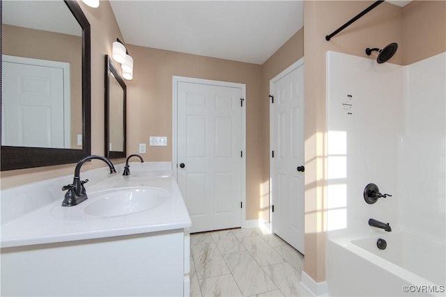 bathroom with vanity and shower / bathing tub combination