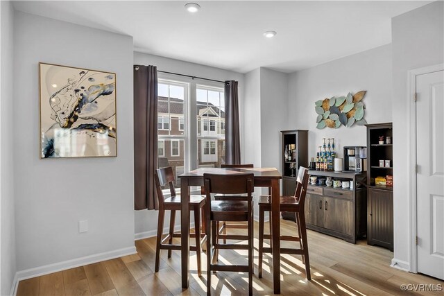 dining room featuring light hardwood / wood-style floors