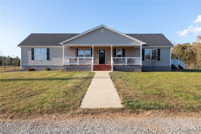 ranch-style house with a front lawn and a porch