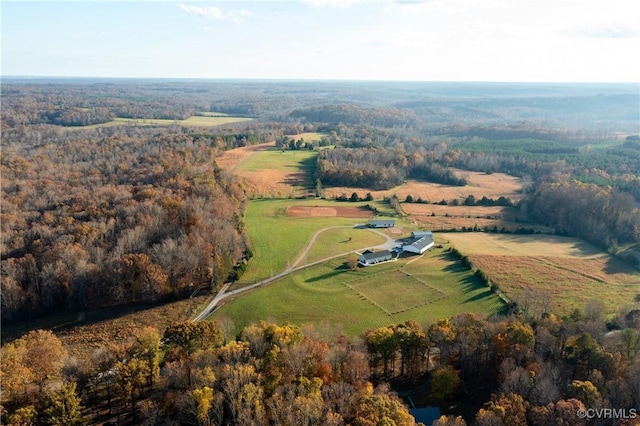 birds eye view of property with a rural view