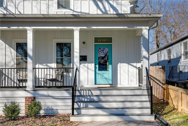 doorway to property with covered porch