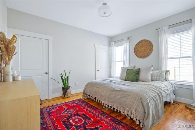 bedroom featuring wood-type flooring