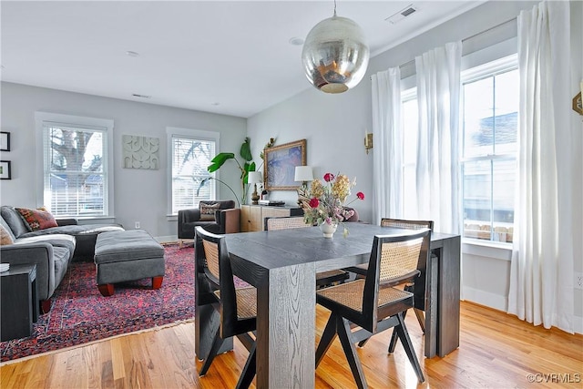 dining area featuring light hardwood / wood-style floors