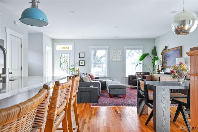 dining space featuring light hardwood / wood-style floors