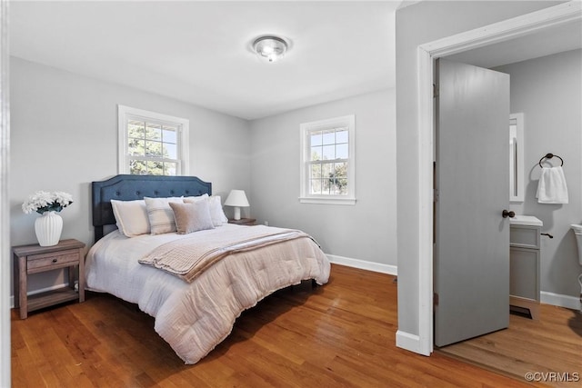 bedroom featuring wood-type flooring