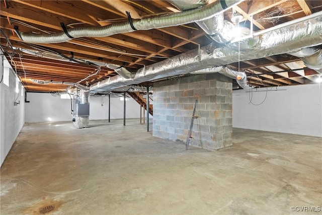 basement featuring heating unit