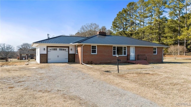 single story home with a garage