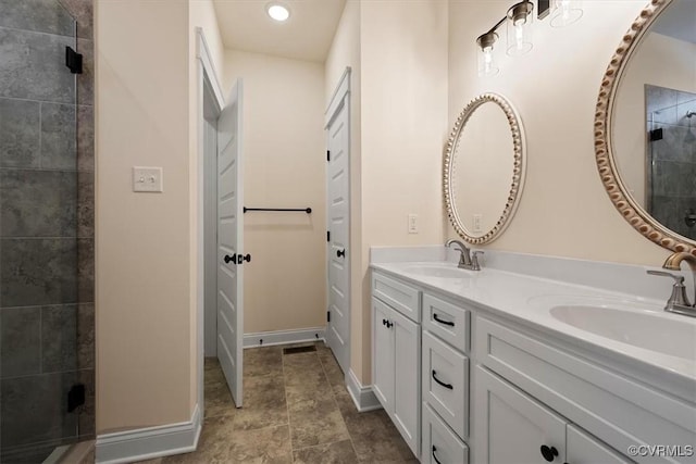 bathroom featuring vanity and walk in shower