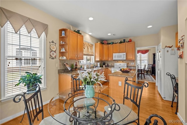 dining area featuring light hardwood / wood-style flooring