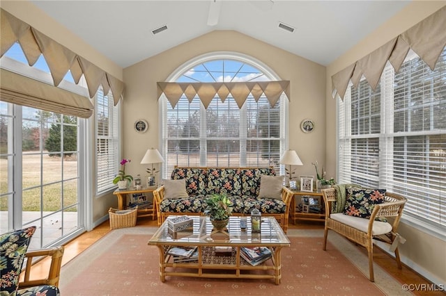 sunroom with vaulted ceiling