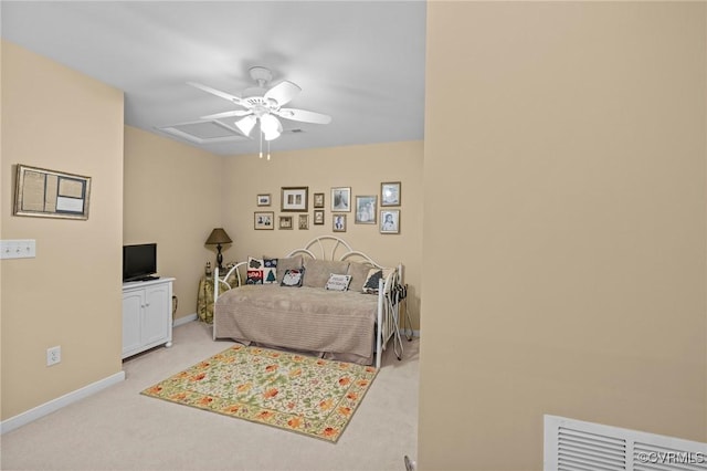 living room featuring light carpet and ceiling fan