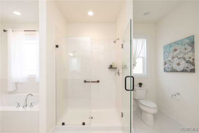 bathroom with toilet and plus walk in shower