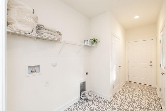 clothes washing area featuring hookup for a gas dryer, hookup for an electric dryer, and washer hookup