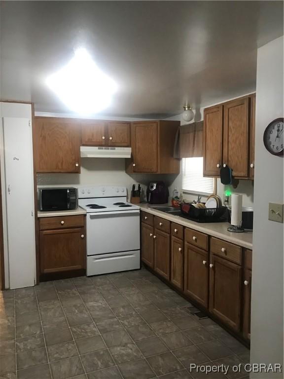 kitchen with white electric range