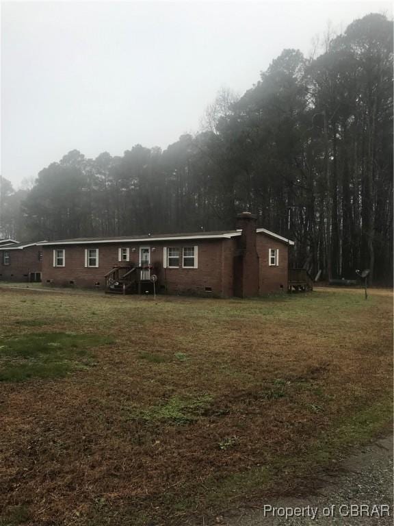 view of front of house with a front yard