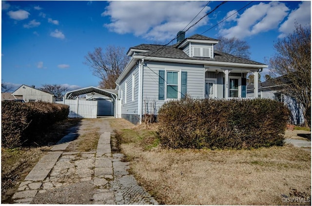 view of property exterior with a carport