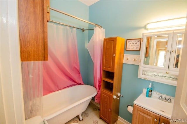 bathroom with vanity and shower / bath combo with shower curtain