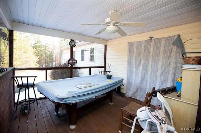 wooden terrace featuring ceiling fan