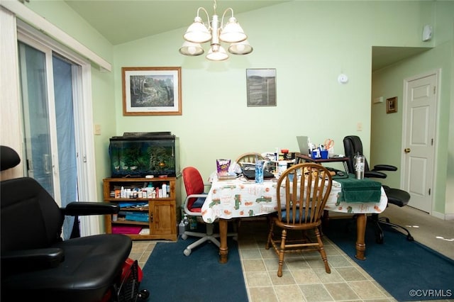 dining area featuring vaulted ceiling and a notable chandelier