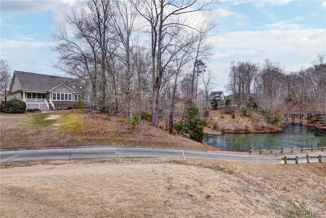 view of yard with a water view