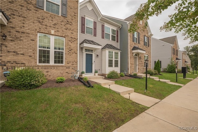 view of front of home with a front lawn