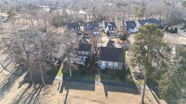 birds eye view of property with a residential view