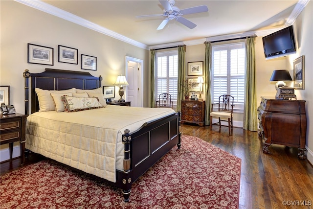 bedroom featuring baseboards, dark wood-style flooring, and crown molding