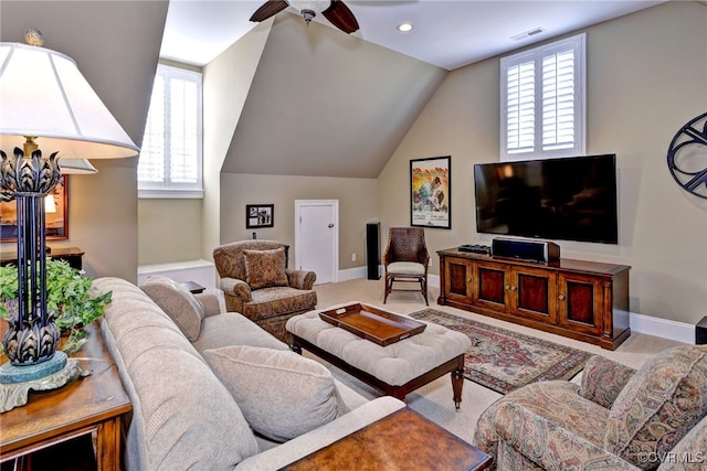 carpeted living room with baseboards, visible vents, and a wealth of natural light