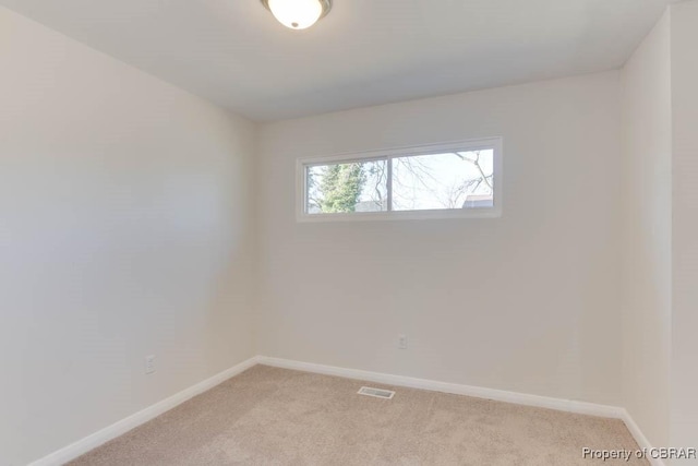 view of carpeted spare room