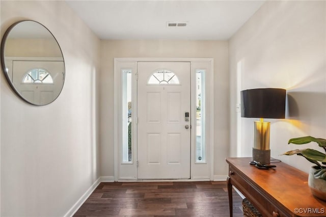 foyer featuring dark wood-type flooring