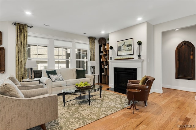 living room with light hardwood / wood-style floors