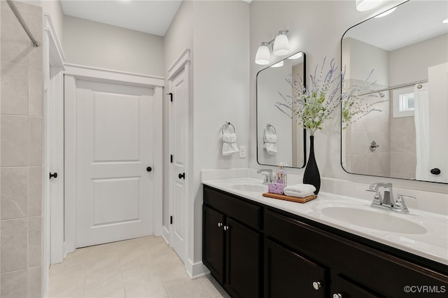 bathroom with vanity and tile patterned floors