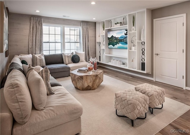 living room with hardwood / wood-style flooring