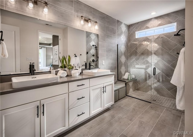 bathroom with vanity and an enclosed shower