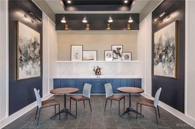 interior space featuring dark tile patterned floors