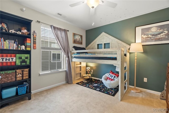 bedroom with ceiling fan and carpet