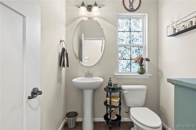 bathroom with sink and toilet