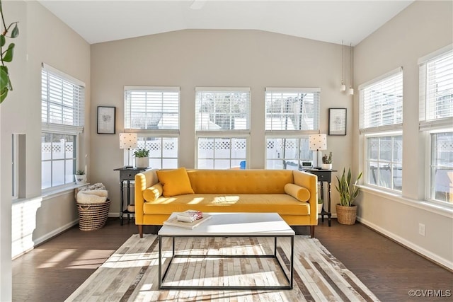 sunroom / solarium featuring lofted ceiling