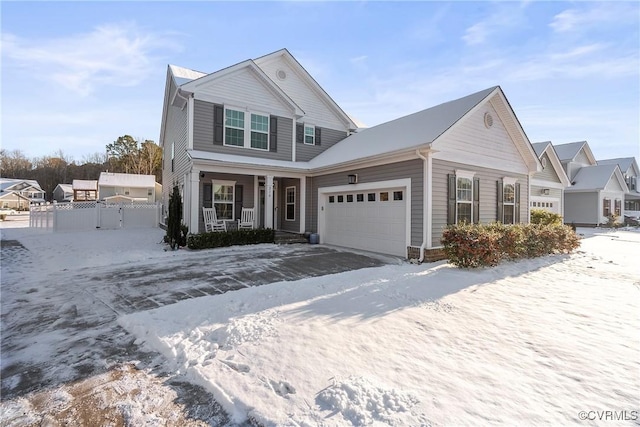 view of front of house featuring a garage and covered porch