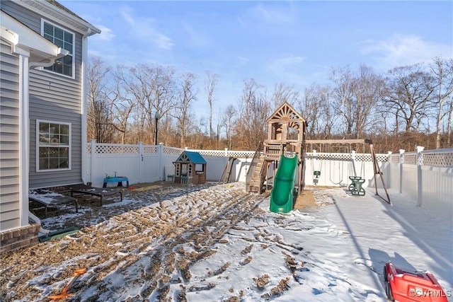 view of snow covered playground