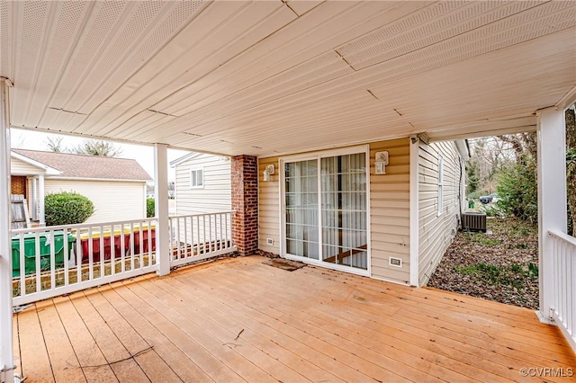 wooden terrace with central air condition unit