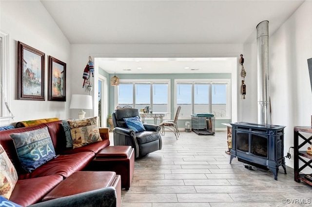 living room with a wood stove