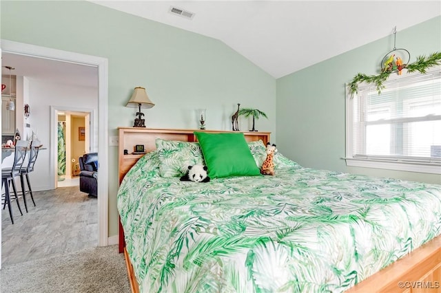 bedroom with vaulted ceiling