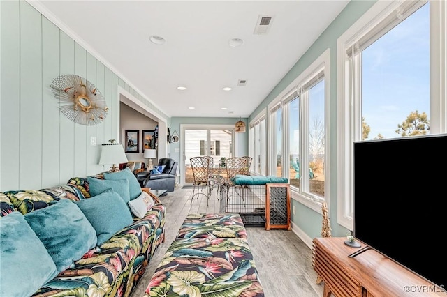 living room with light hardwood / wood-style flooring